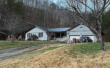 Photo of 50-Acre Kentucky Property with Home, Garage, and Unlimited Potential – Paintsville, KY